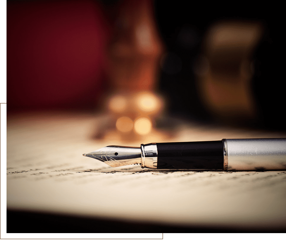 Fountain pen resting on a paper document.